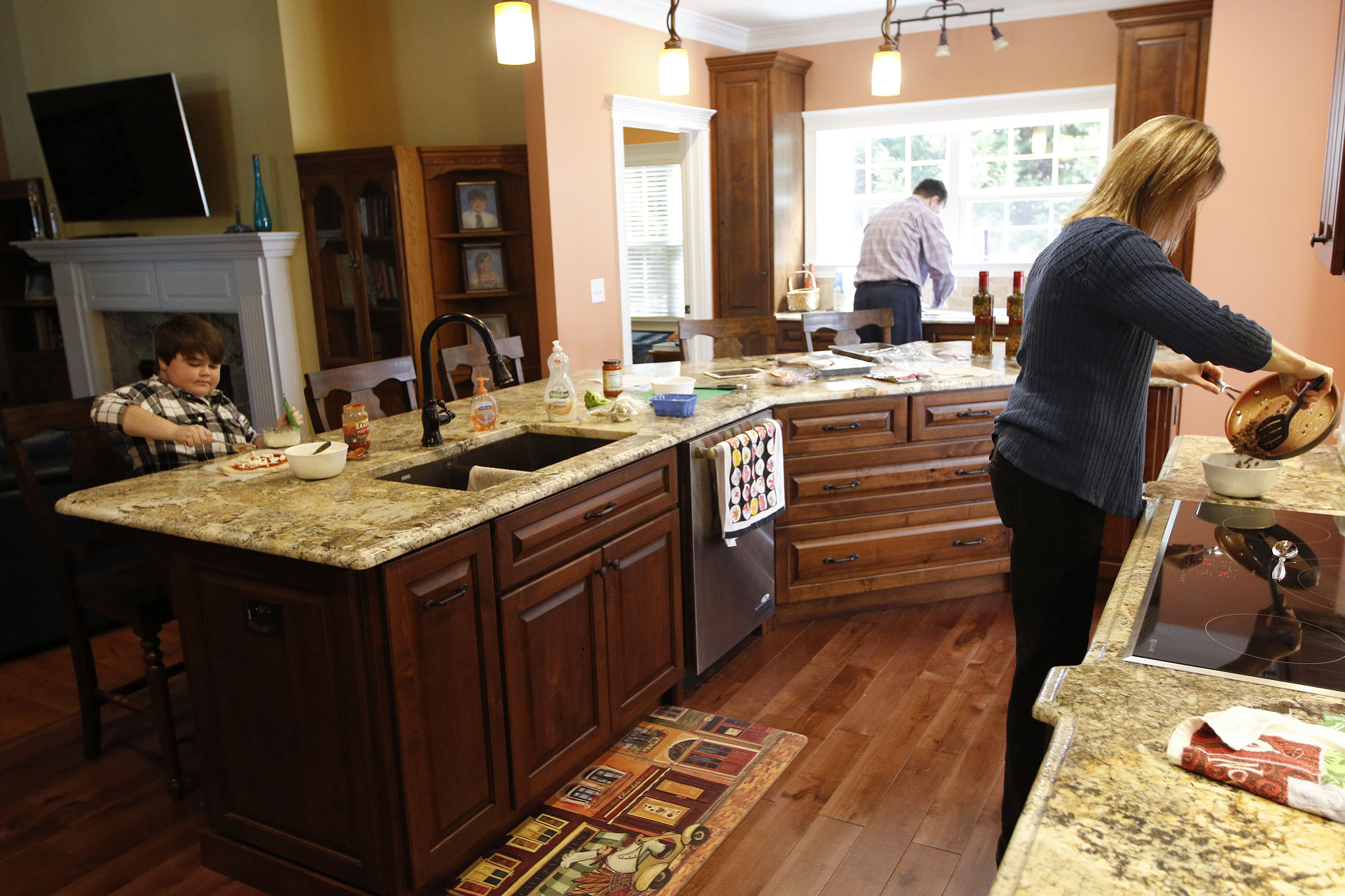 wide aisles, shorter countertops in accessible kitchen