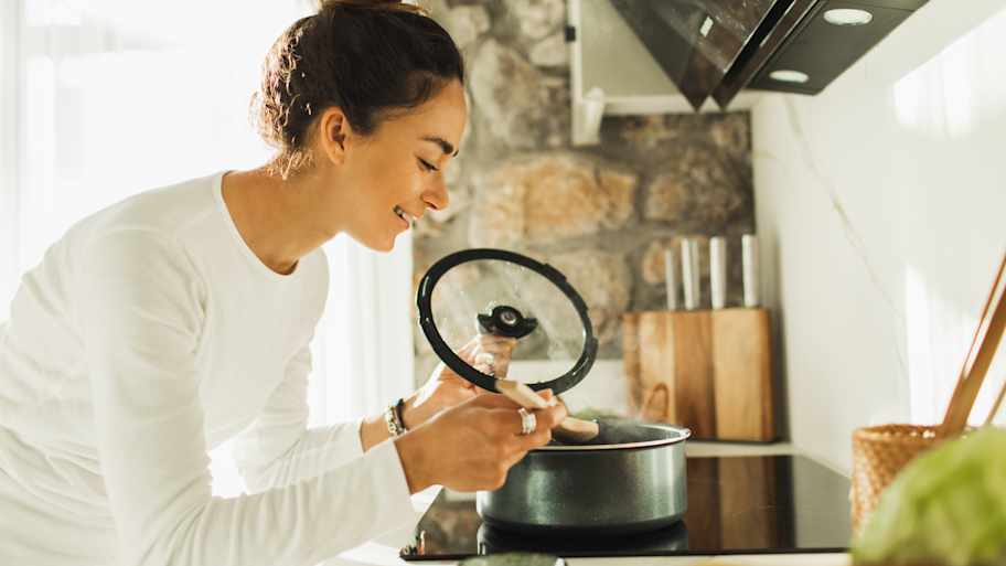 Woman cooking lunch