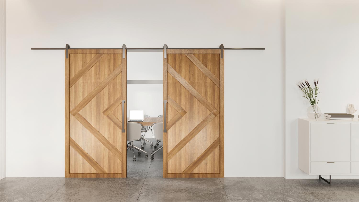 A 2-panel sliding barn door leading to a home office 