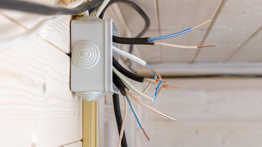 Junction box with exposed wires 