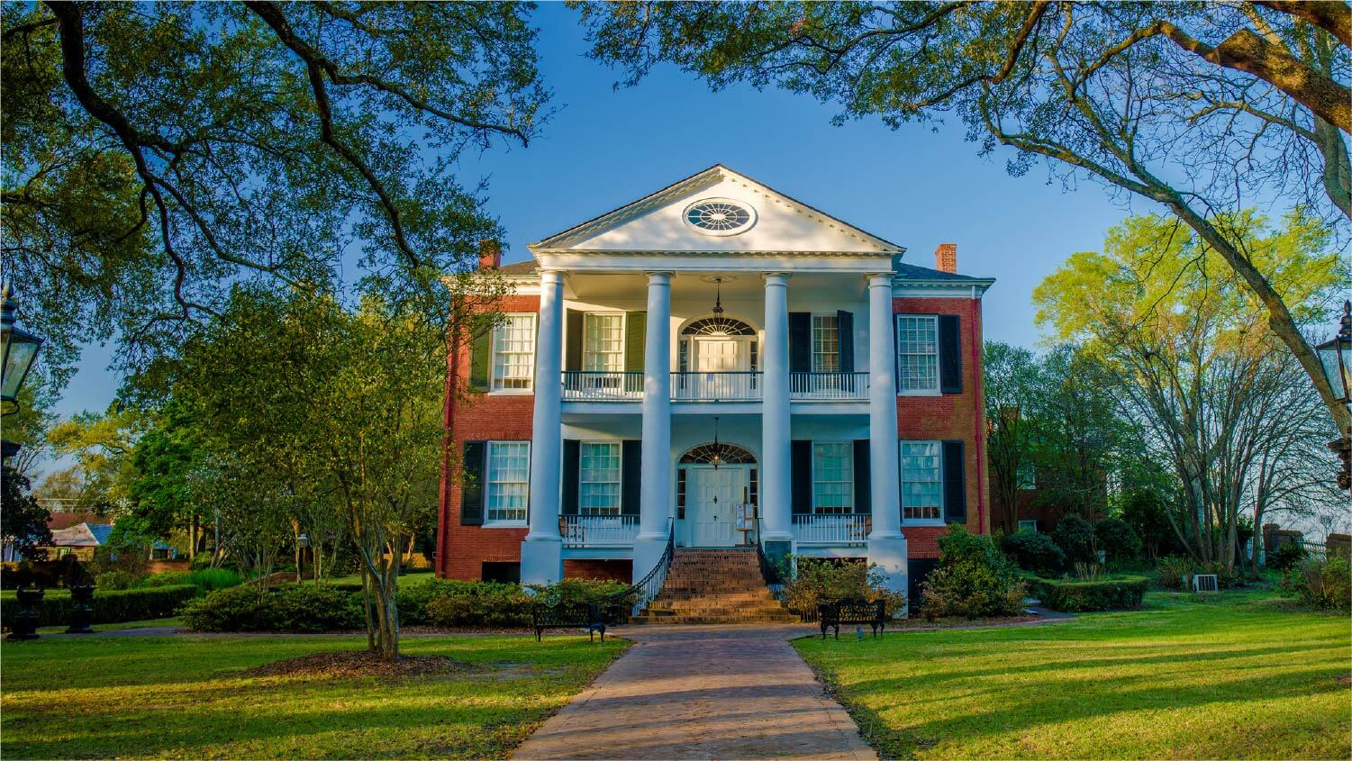 Grand brick house with large columns