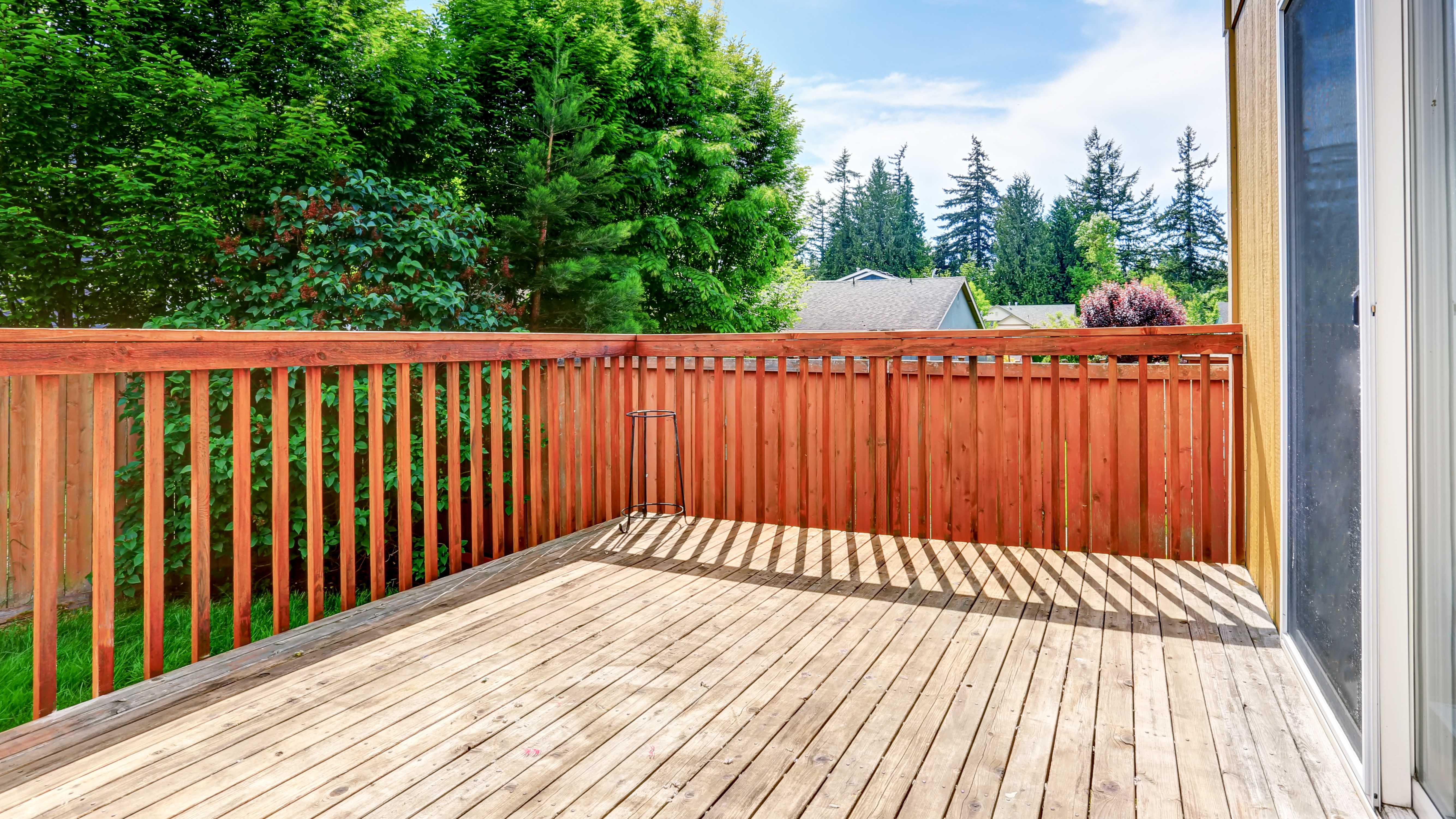 Raised deck with a wooden railing 
