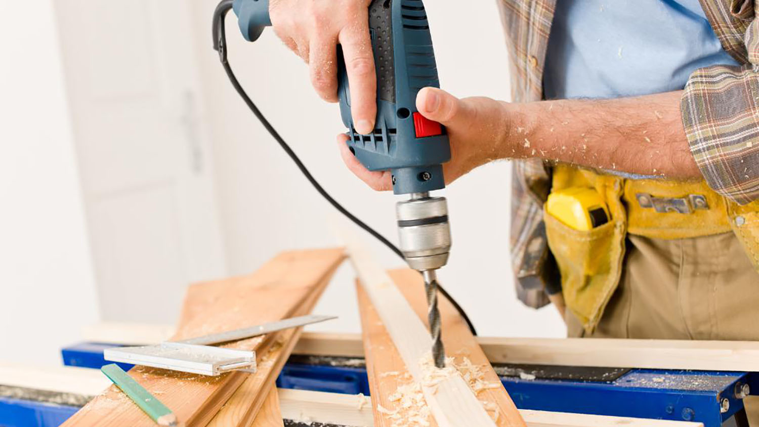 Drilling into wood plank