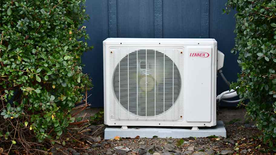 Mini split ac between bushes