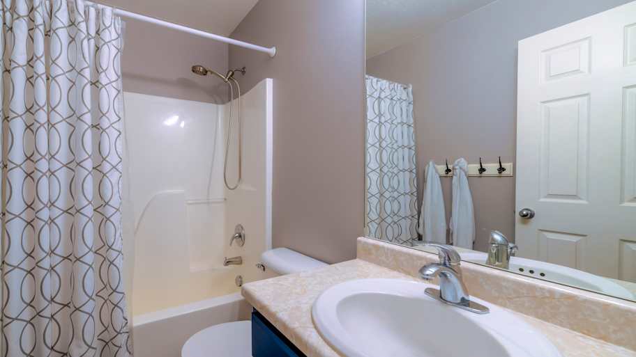 Large bathroom with acrylic shower