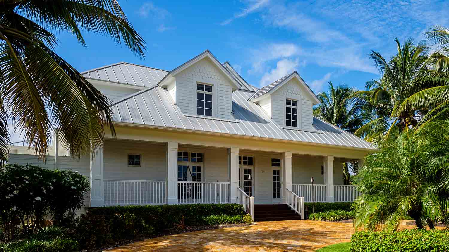 white tropical house with aluminum style