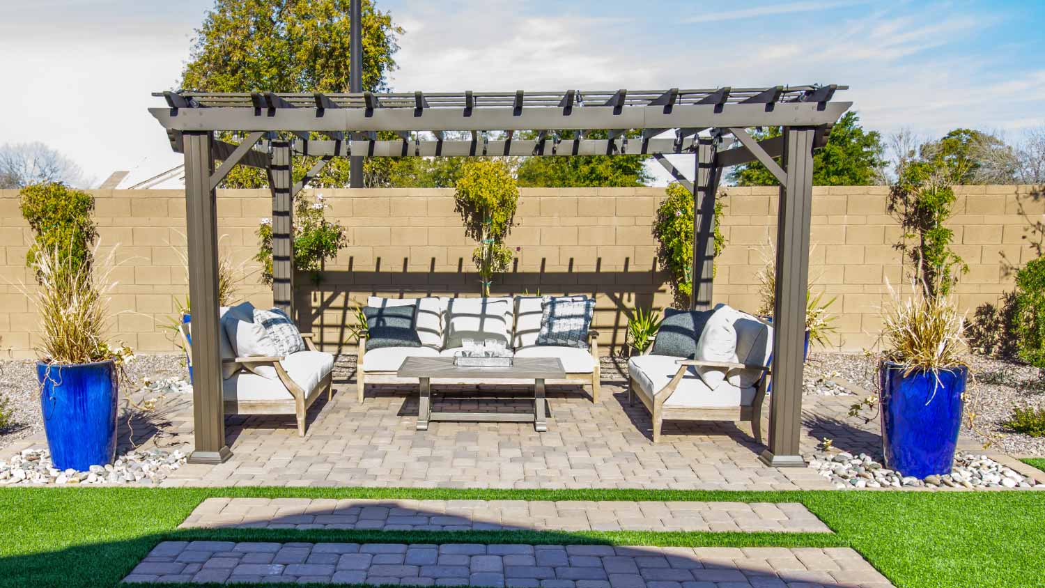 Backyard arbor covering couches