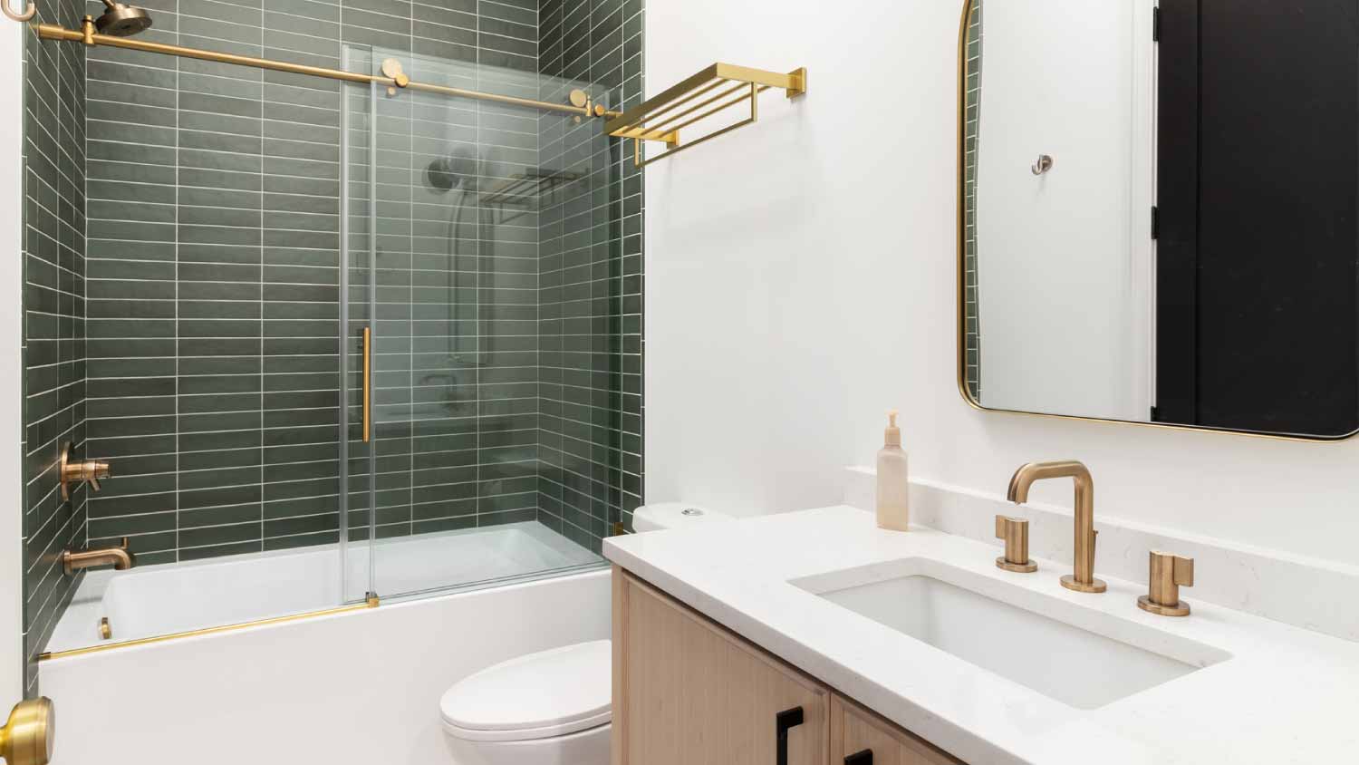 Bathroom with green tiles