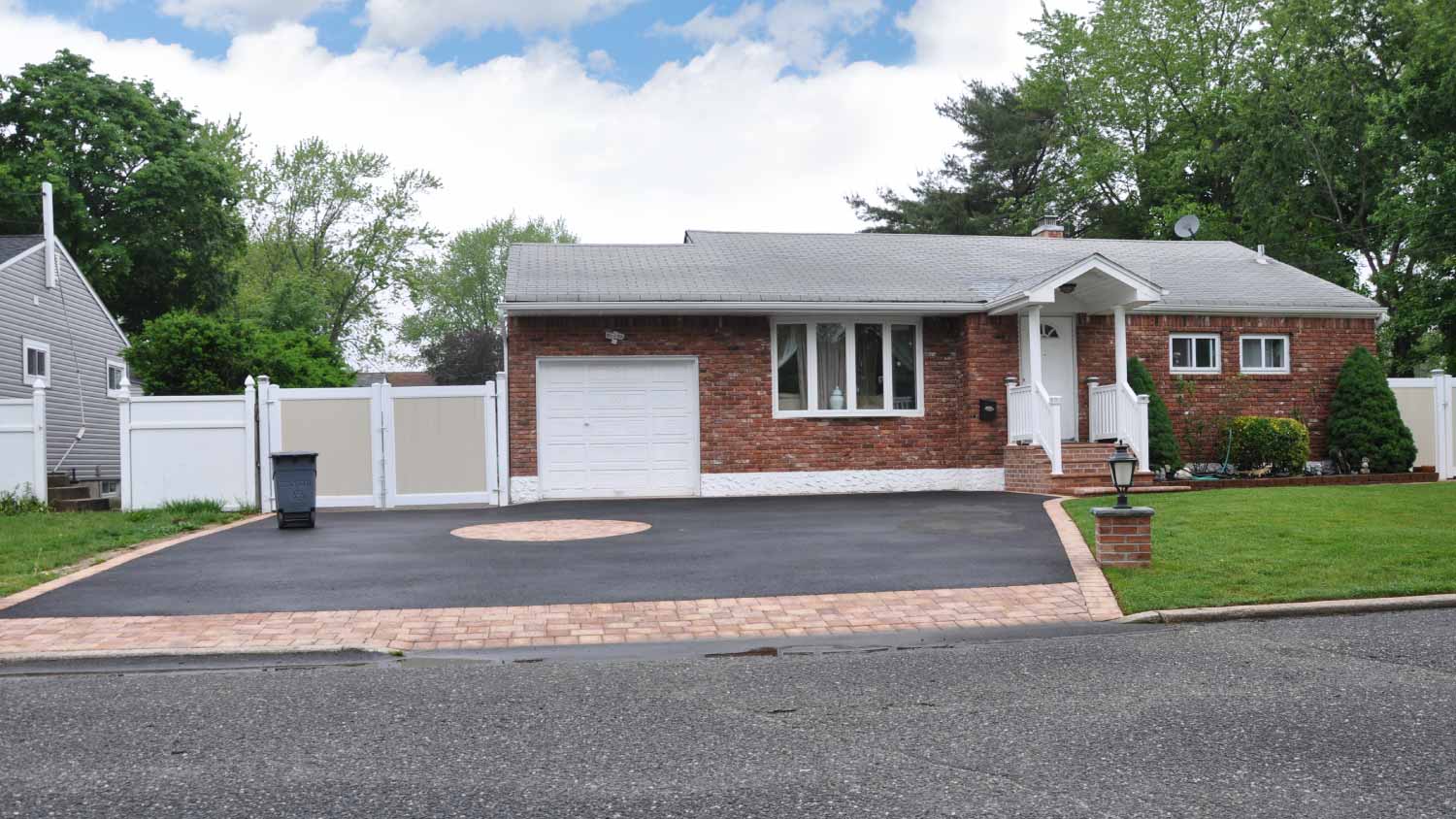 Brick ranch home driveway