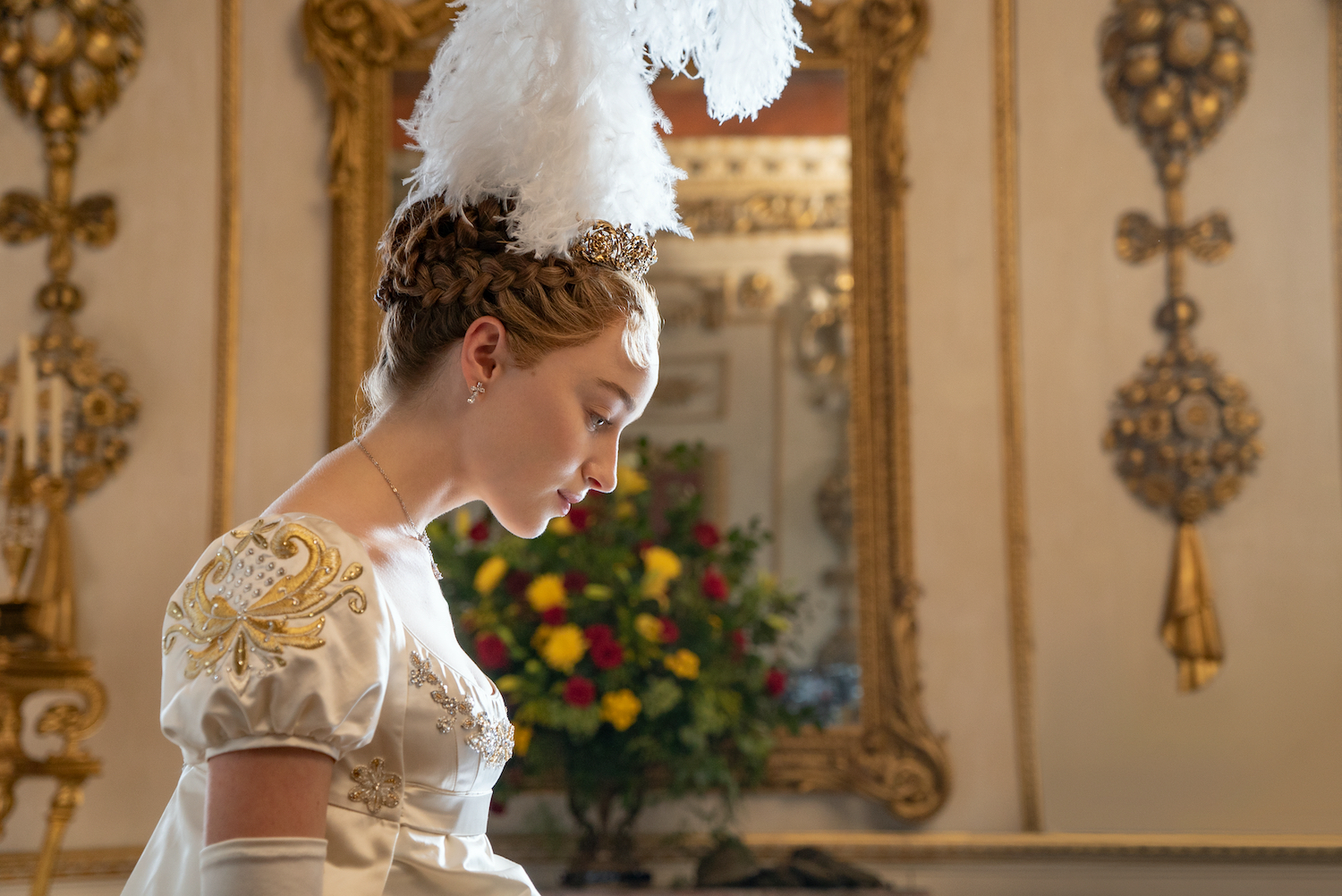 Young woman dressed in white Regency era costume