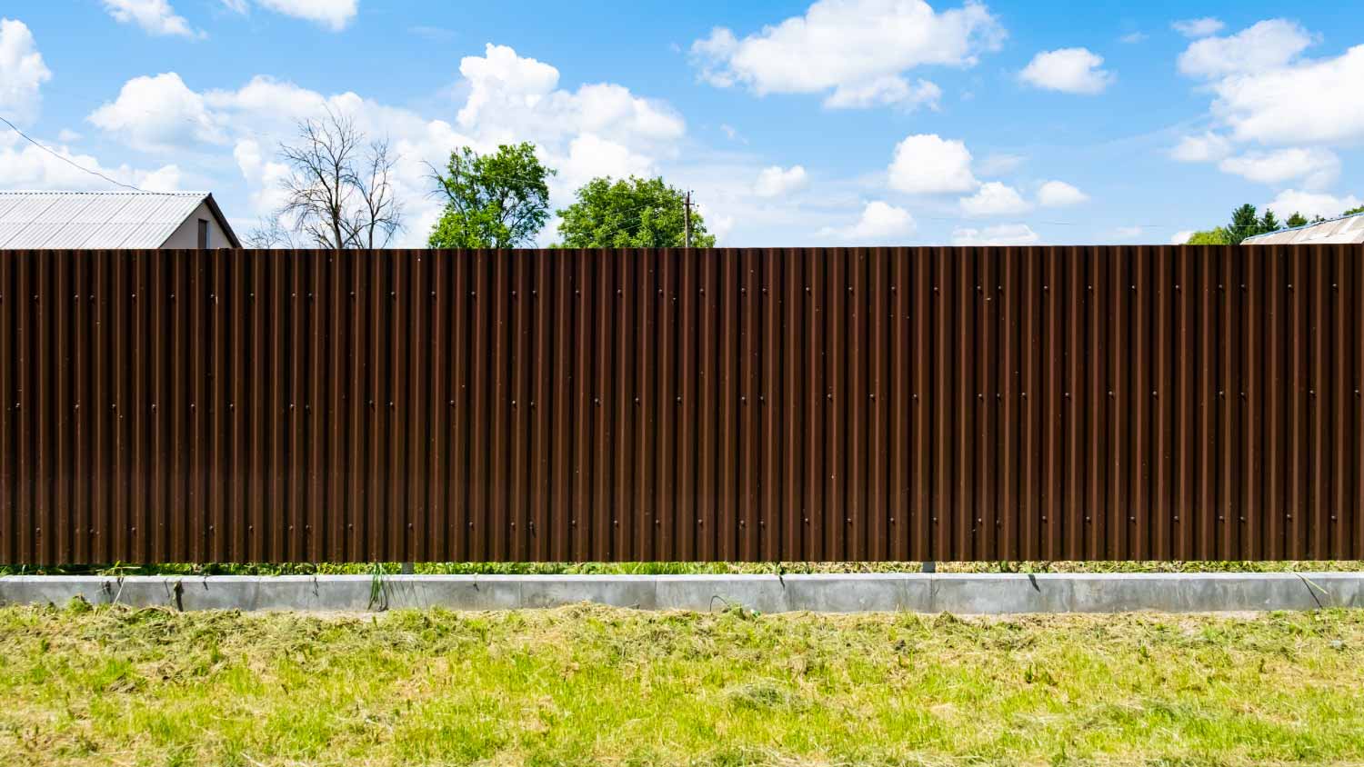 Brown metal corrugated fence