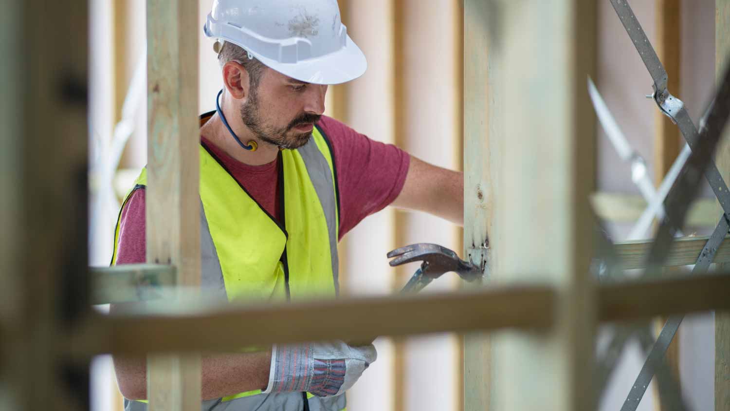 Carpenter working on building site