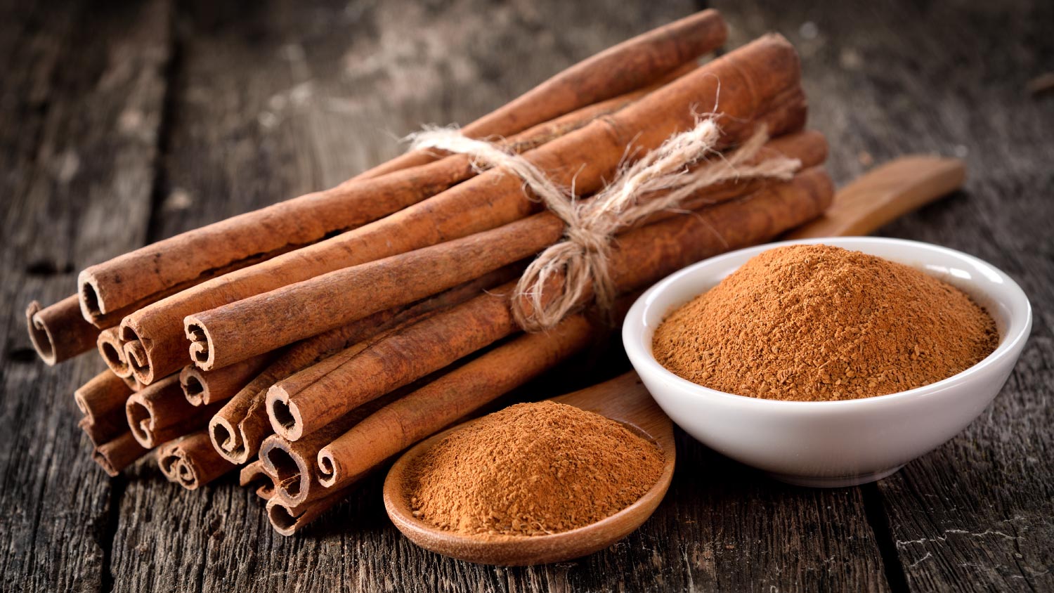 Cinnamon powder on table wooden