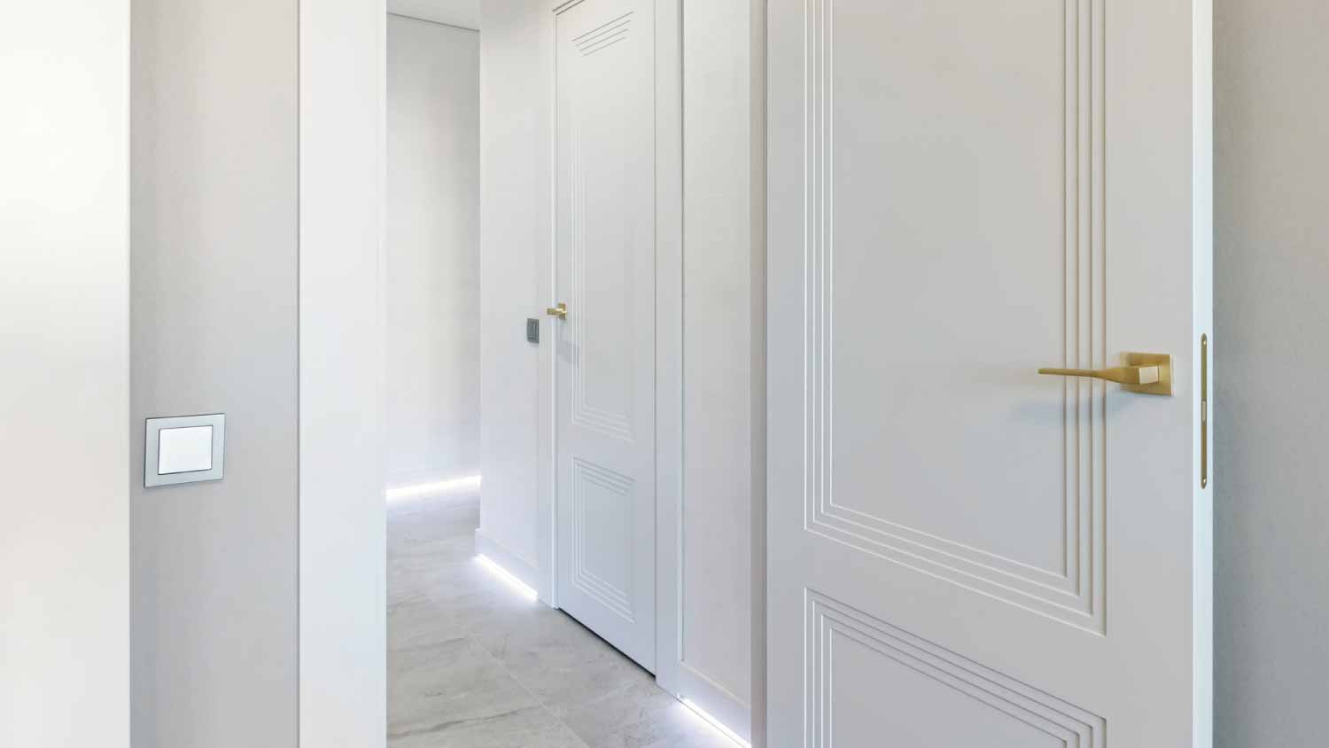 Classic white door with golden handle