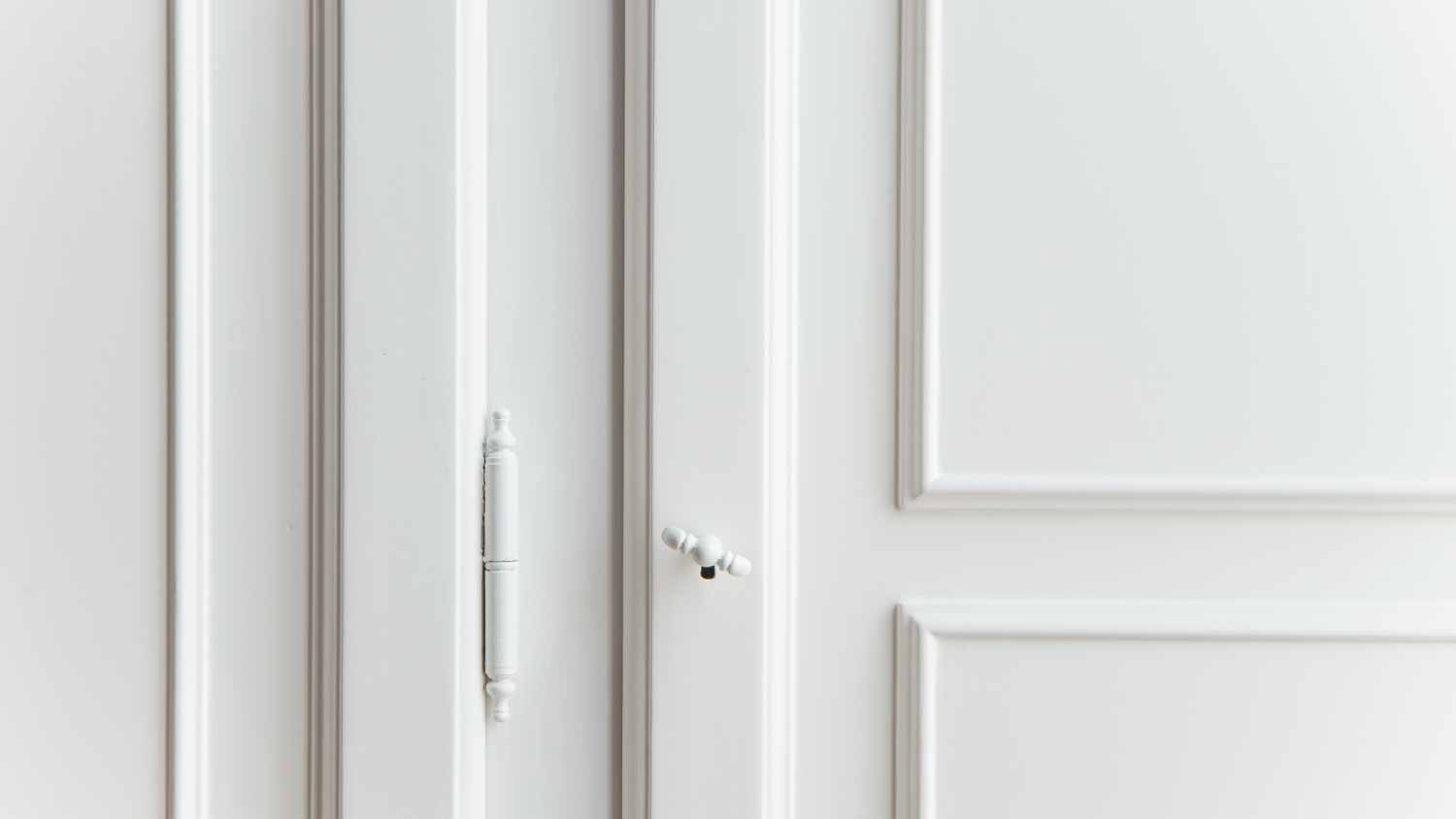 Close up of a white door