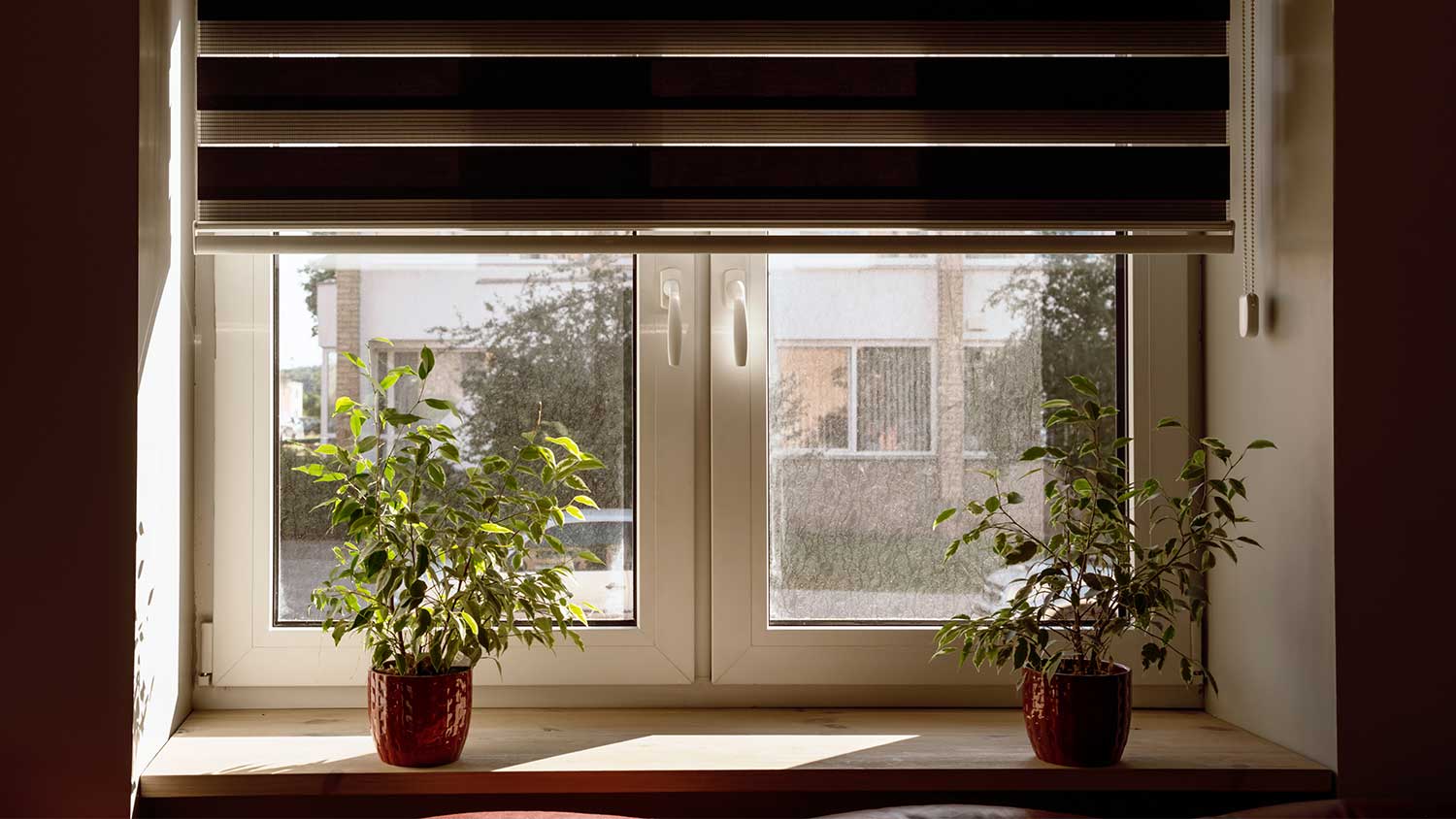 Closed blinds in bedroom at home