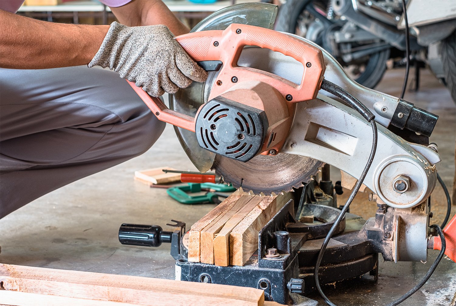 Man using compound miter saw