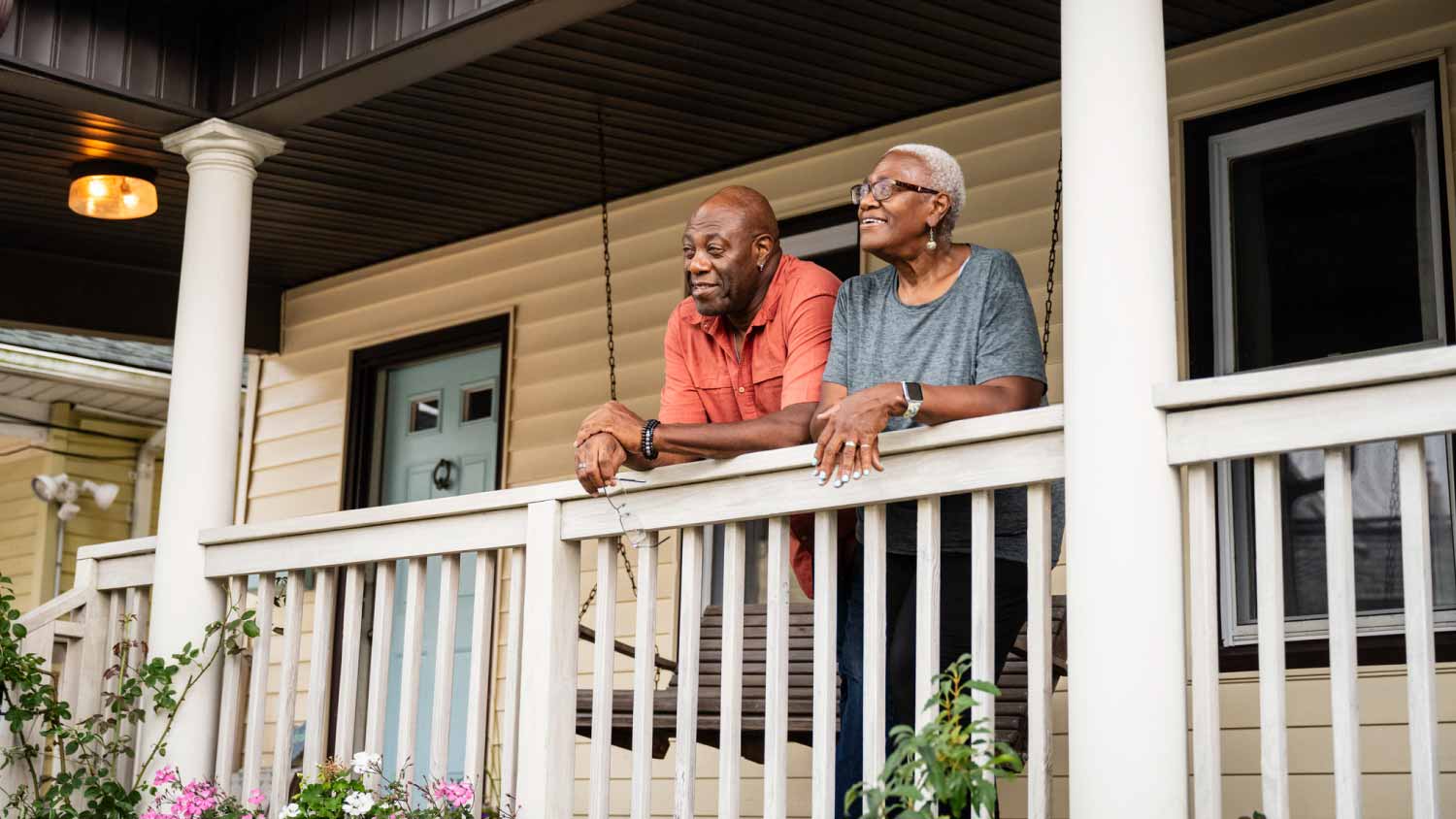 Couple relaxing on veranda