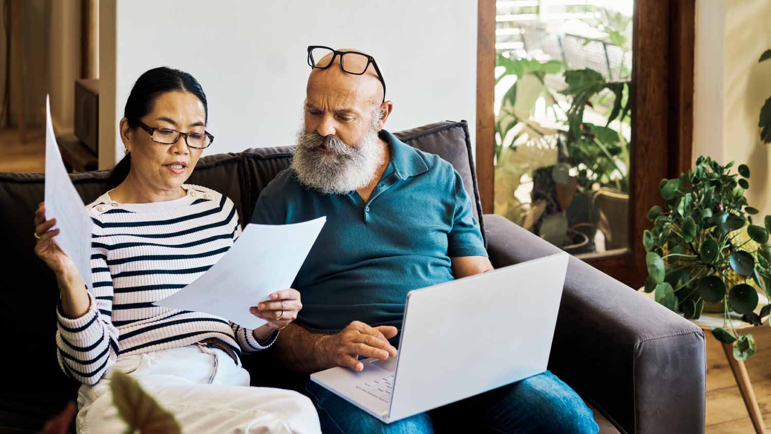 Couple using a laptop