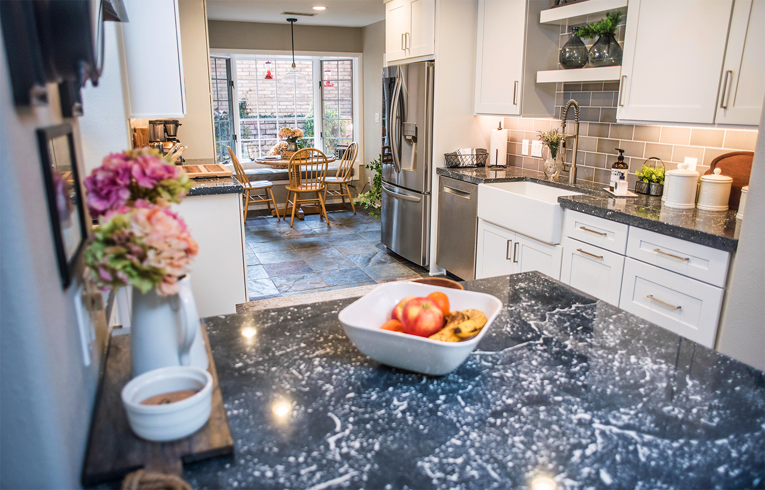 Modern kitchen with dark granite counter