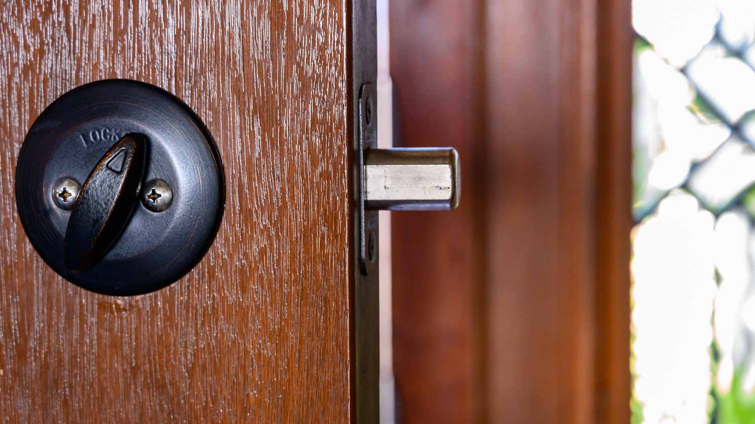 Deadbolt on wooden door