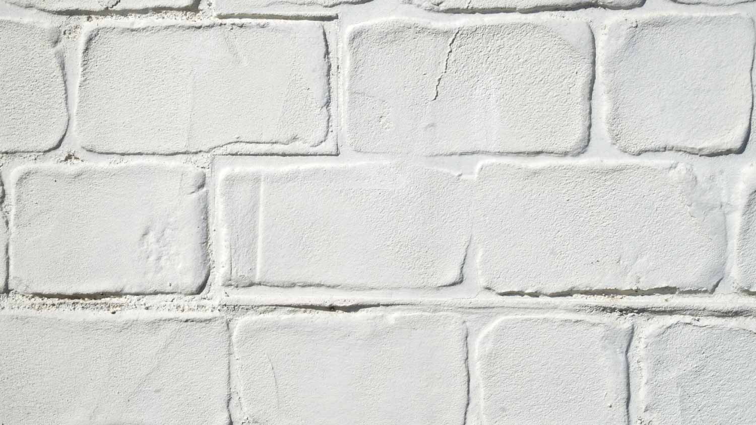 Decorative white stucco imitating brick