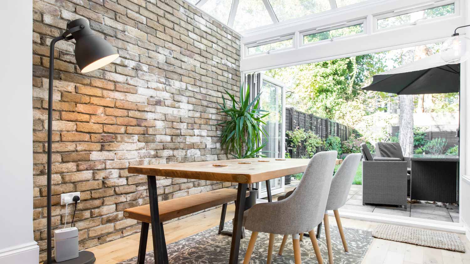 Dining room with brick wall