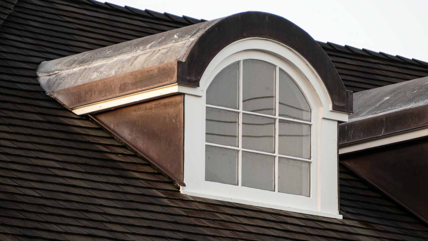 Dormer with white arched window