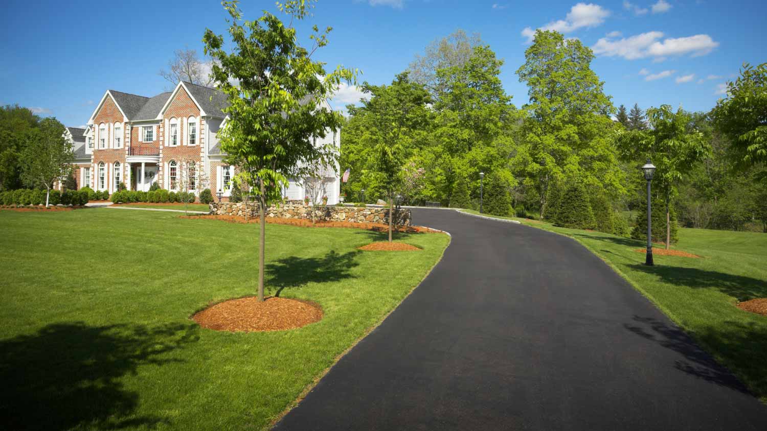 Driveway leading to suburban house