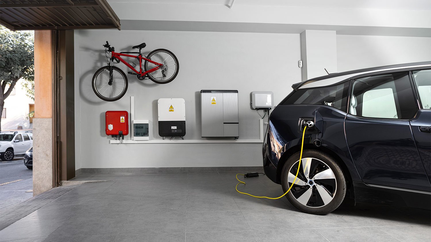 Electric car charging in the garage.