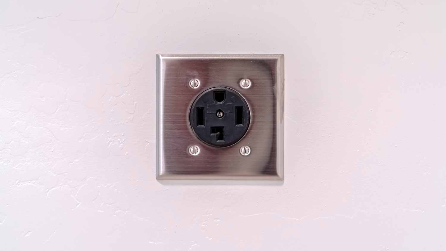 Electric plug connection for a washing machine