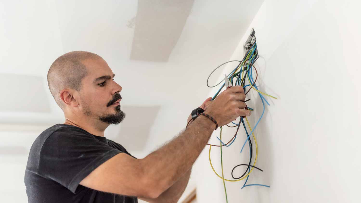 Electrician checking circuit and cables