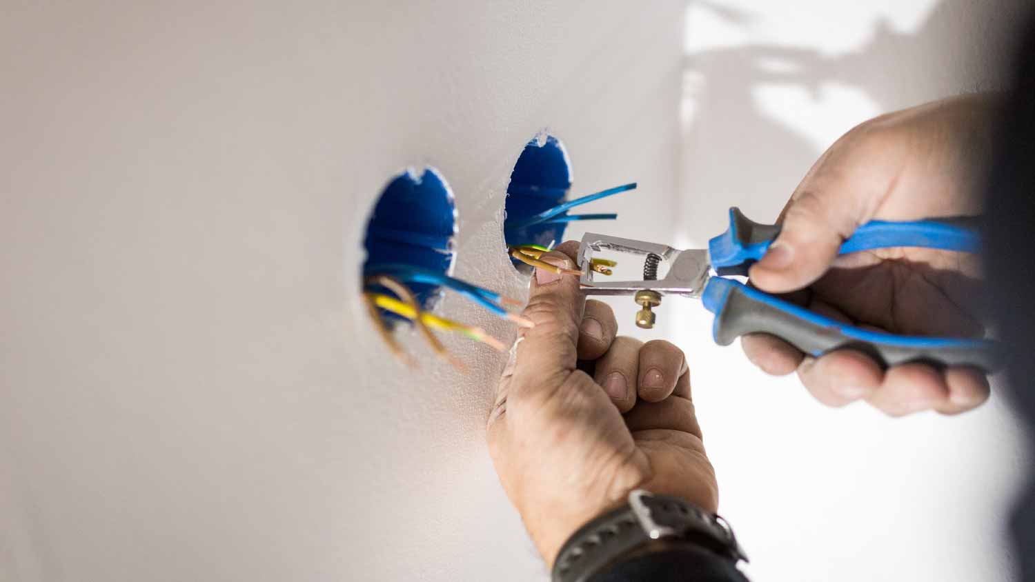 Electrician cleaning wires