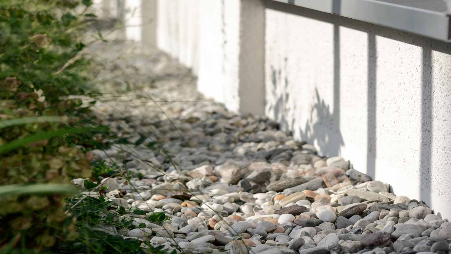 French drain covered with drainage rocks