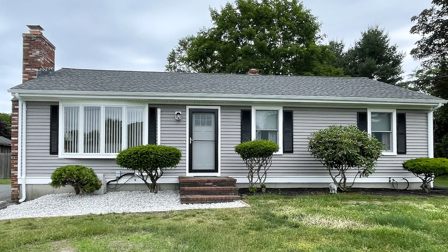 Gray house with black shutters