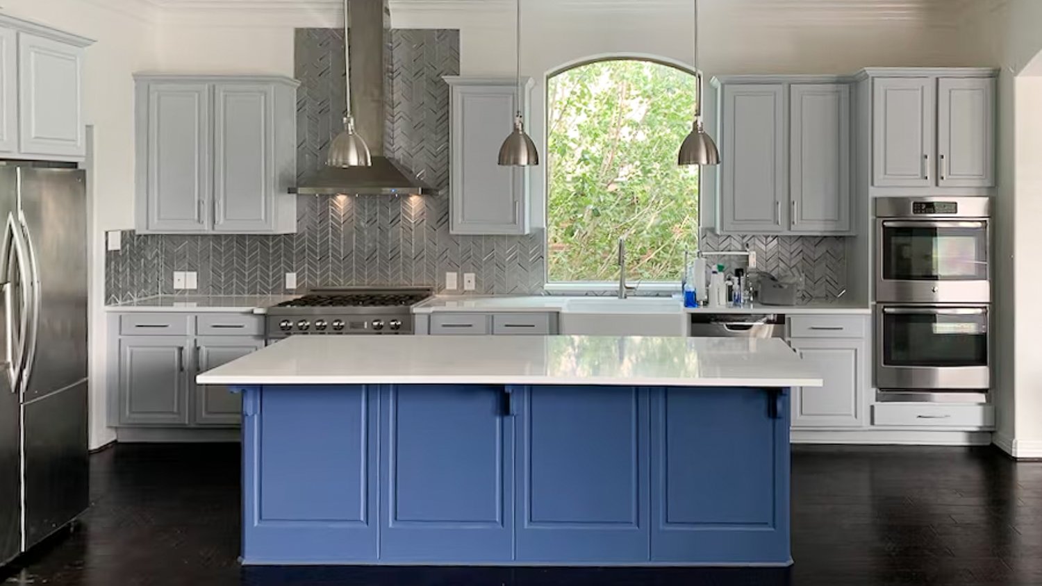 Gray kitchen with blue island