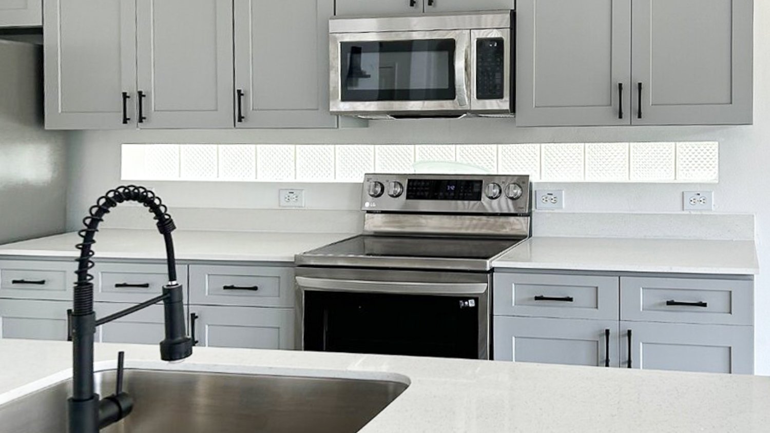 Gray kitchen with white island