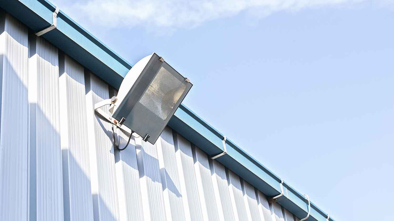 HID security light installed on a commercial building