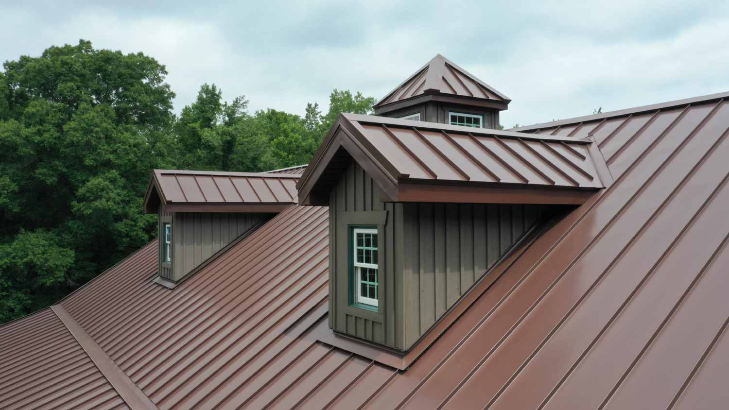 House with brown metal roof