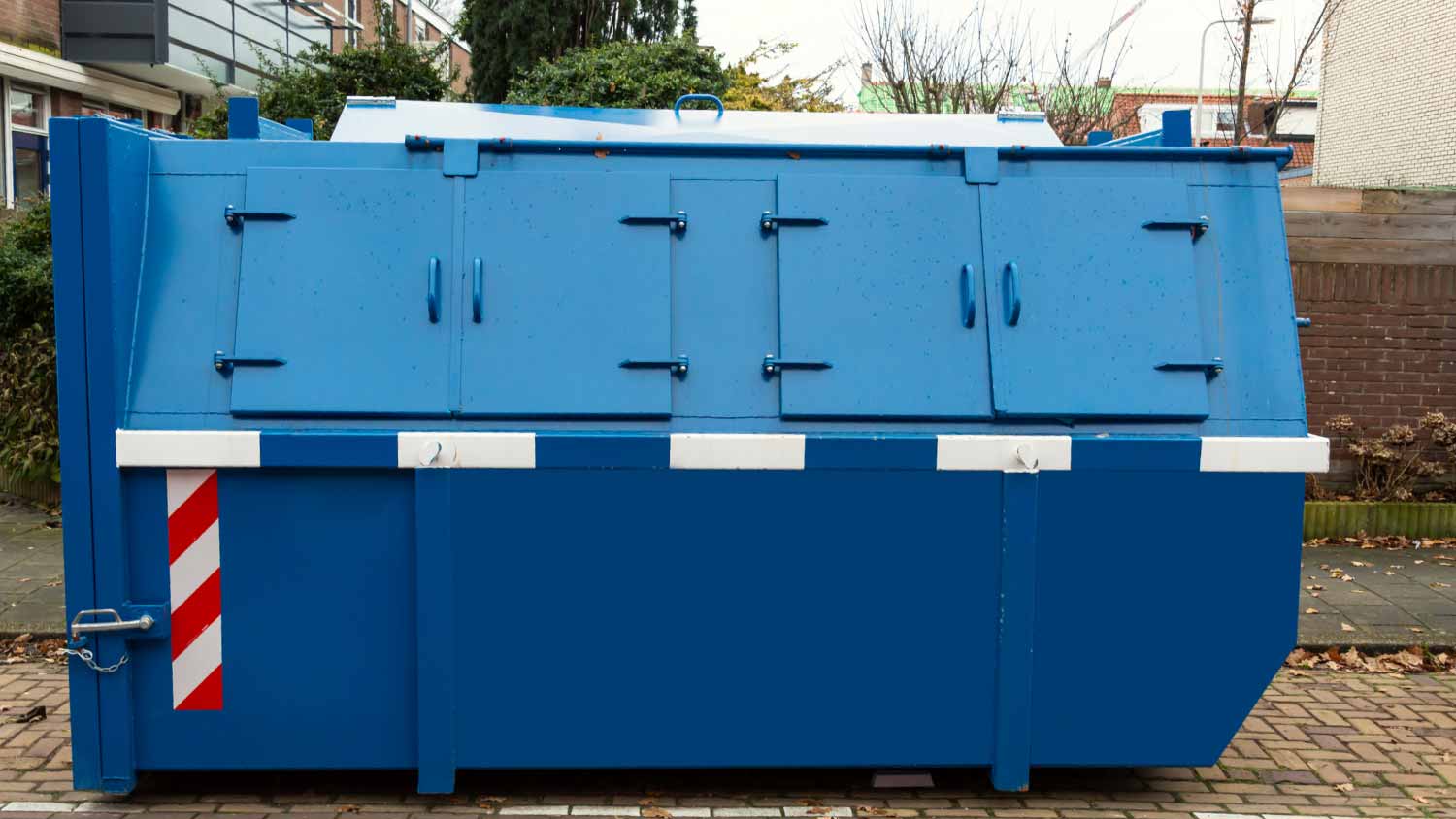 Large blue steel waste container