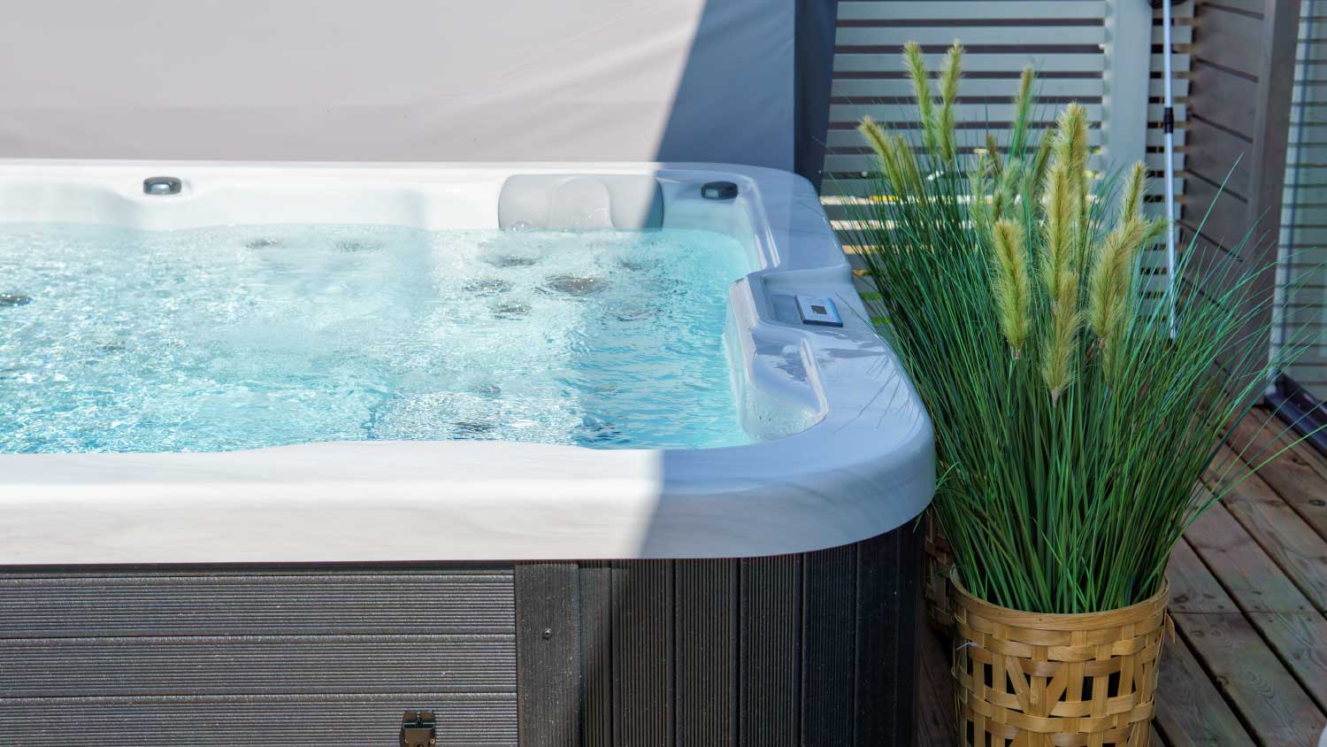 Luxurious hot tub on the backyard terrace 