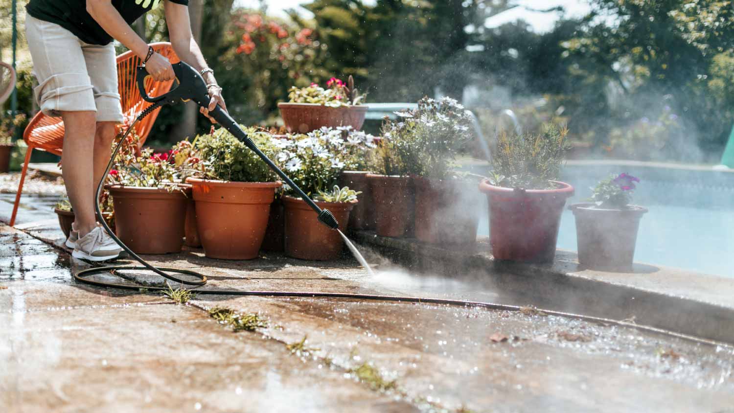 Man cleaning with high pressure water cleaning