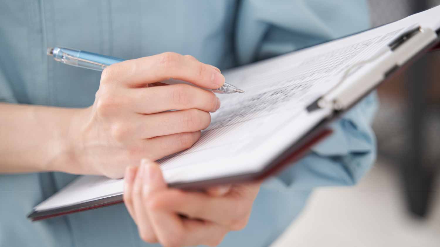 Man holding a clipboard