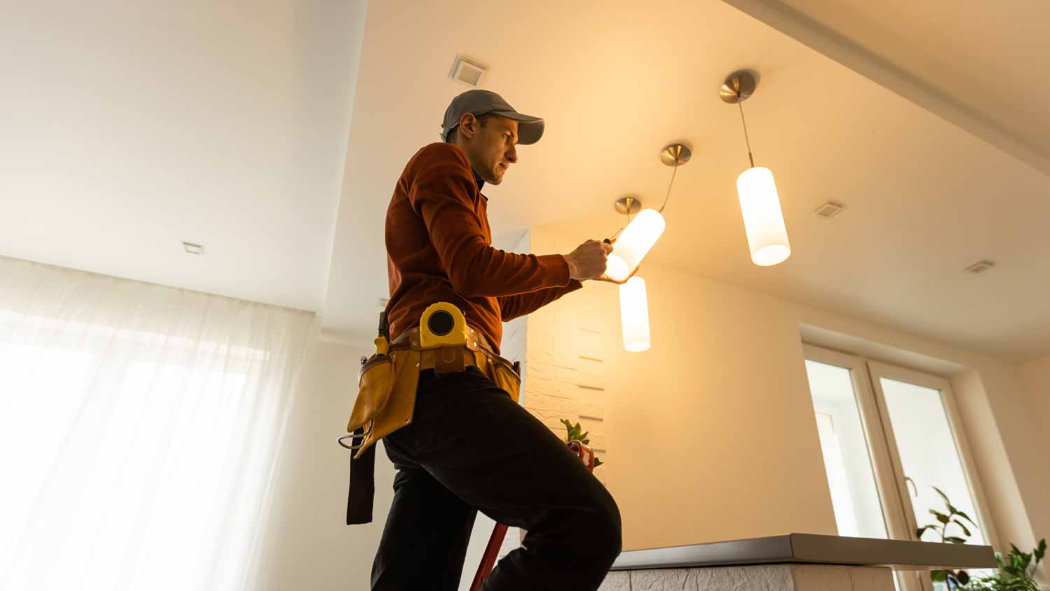 Man installing interior light 