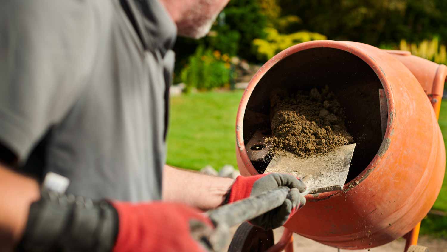 Man loading the cement mixer