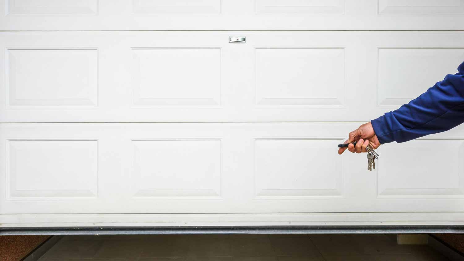 Man opening garage door