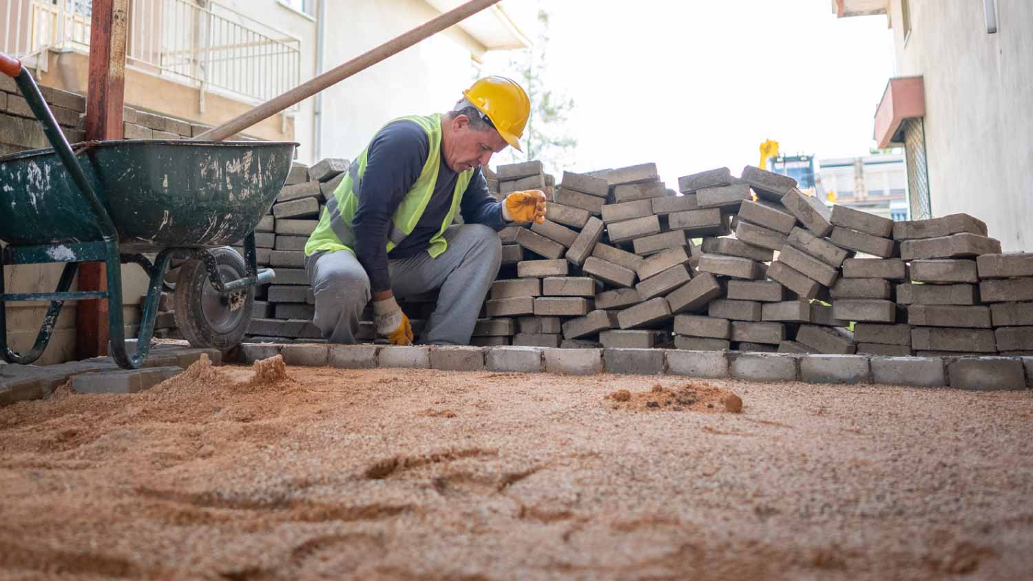 Man paving stones