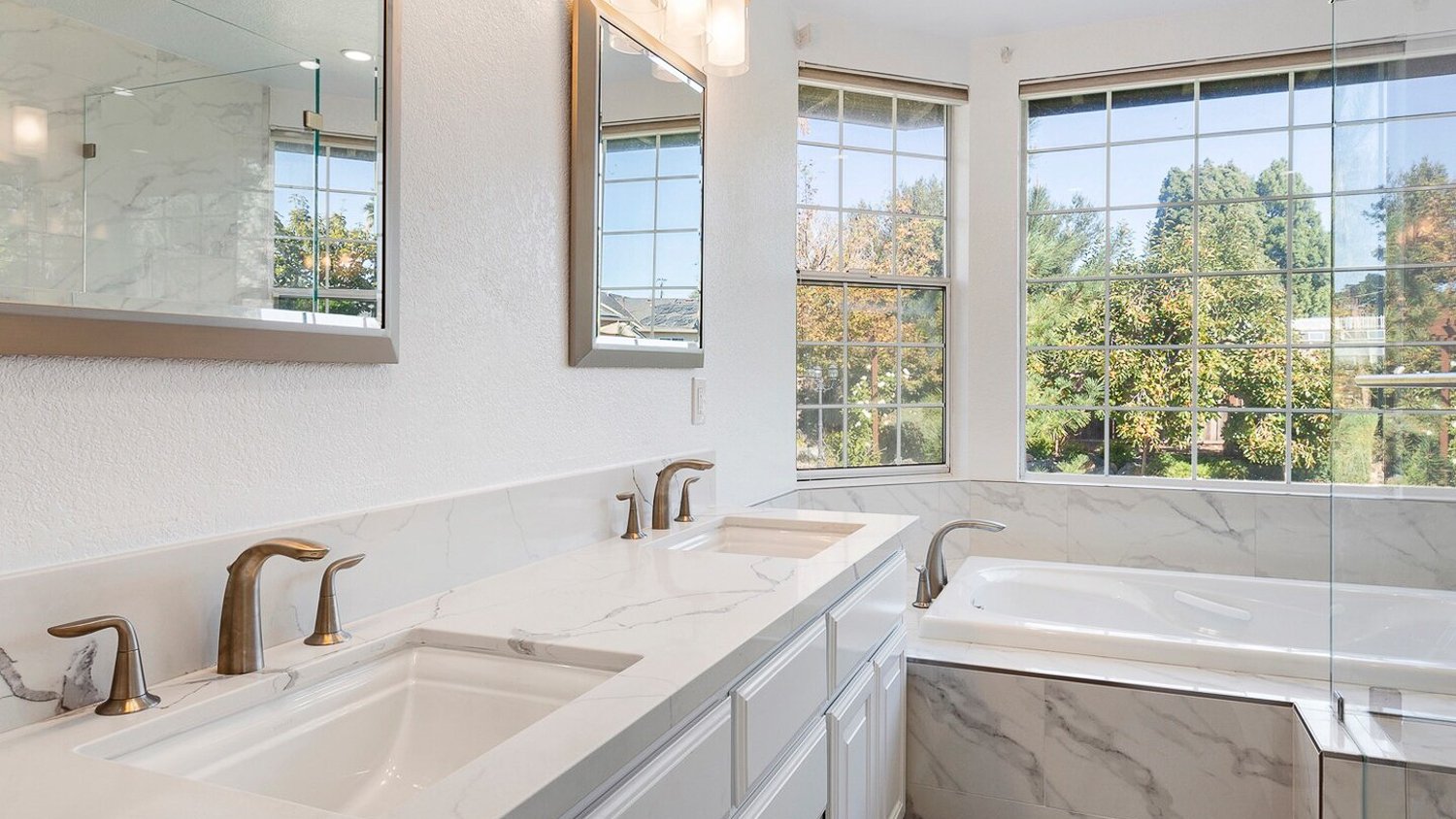 Master bathroom with bathtub