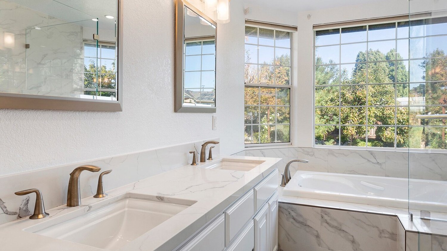 Master bathroom with bathtub 