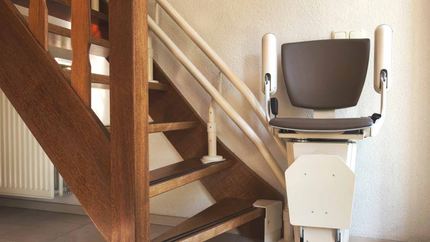 Automatic stair lift on staircase